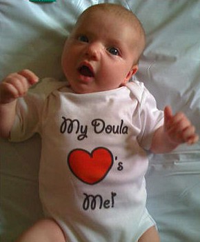 Baby wearing loves doula top